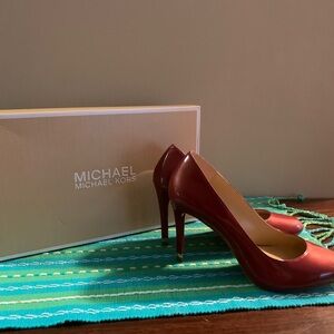 Michael Kors Classic Red Heels
Never worn